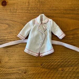 TWIGGY'S DOLL HOSPITAL
White Faux Leather Jacket with Red Stitching as is